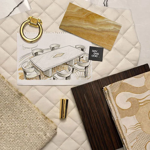 Mood board con pelle trapuntata, campione di legno Ebony Macassar e maniglia ad anello dorata